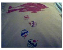 CUPCAKES AWAY: suspicious Urban Outfitters shirt features airplane, tasty treats. 