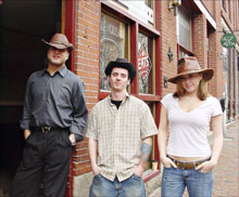 GIDDY UP: Alehouse owner Russ Riseman, hardrocker Sean Libby (from The Horror and The End Of Everything), and Alehouse manager Kristen Parquette are ready for rootin' tootin'.