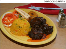 ALL FIRED UP: Flames II brings hearty Jamaican food to the medical district.